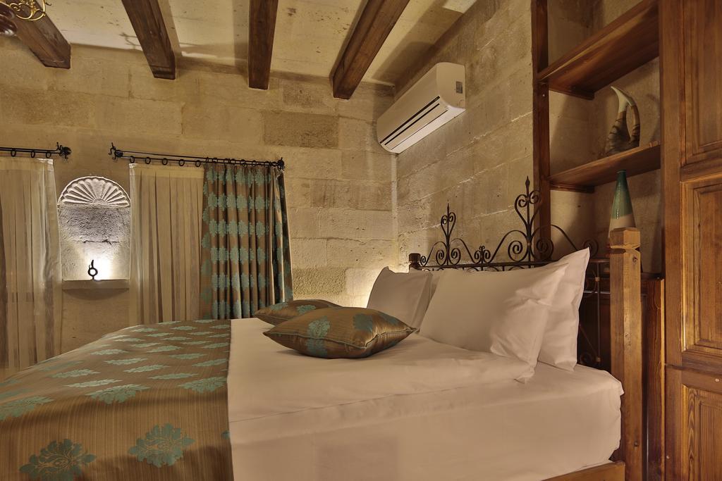 Aren Cave Hotel And Art Gallery Гьореме Стая снимка